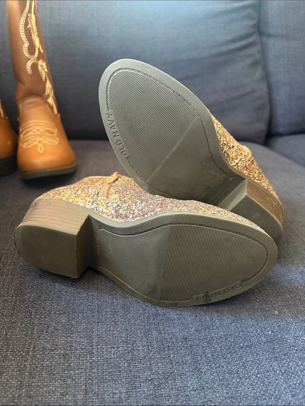 Pair of Brown Western Boots and Multicolor Glitter Ankle Boots